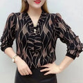 Wave printed V-neck blouse by Showlu Fashion with pearl and diamond decorations, stylish bandage design for spring and autumn.