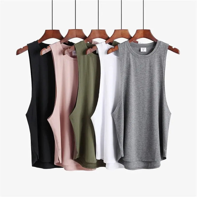 Men's cotton gym stringer tank top from Muscleguys, showing a sleeveless bodybuilding vest in solid color, ideal for fitness wear.