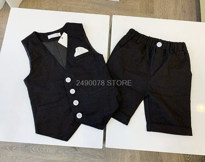 Showlu Fashion Boys white wedding suit with blazer, bowtie, and formal trousers, perfect for kids' ceremonies and parties.