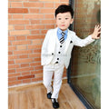 White boys' wedding suit with blazer and bowtie, formal tuxedo for kids, perfect for ceremonies and special occasions.