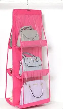 Transparent hanging handbag organizer by Anel Demosthene, with multiple compartments for closet storage and door hanging convenience.