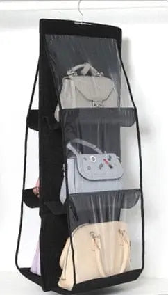 Transparent hanging handbag organizer from Anel Demosthene, with multiple compartments for wardrobe storage and door hanging.