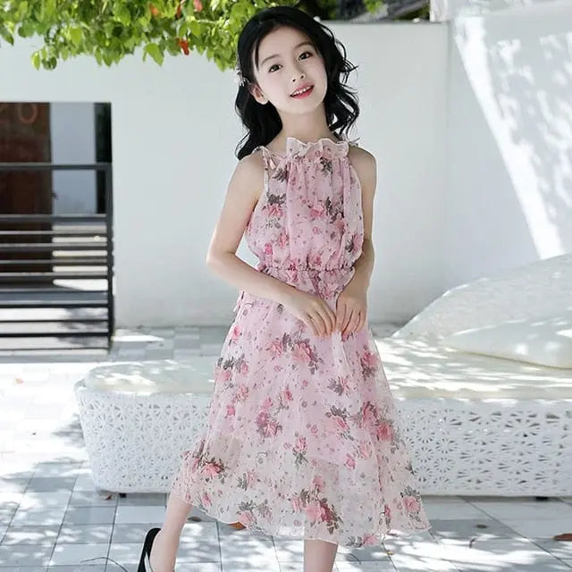 Girls floral chiffon beach dress by Showlu Fashion Store, sleeveless A-line summer dress for kids aged 6-14, perfect for summer parties.