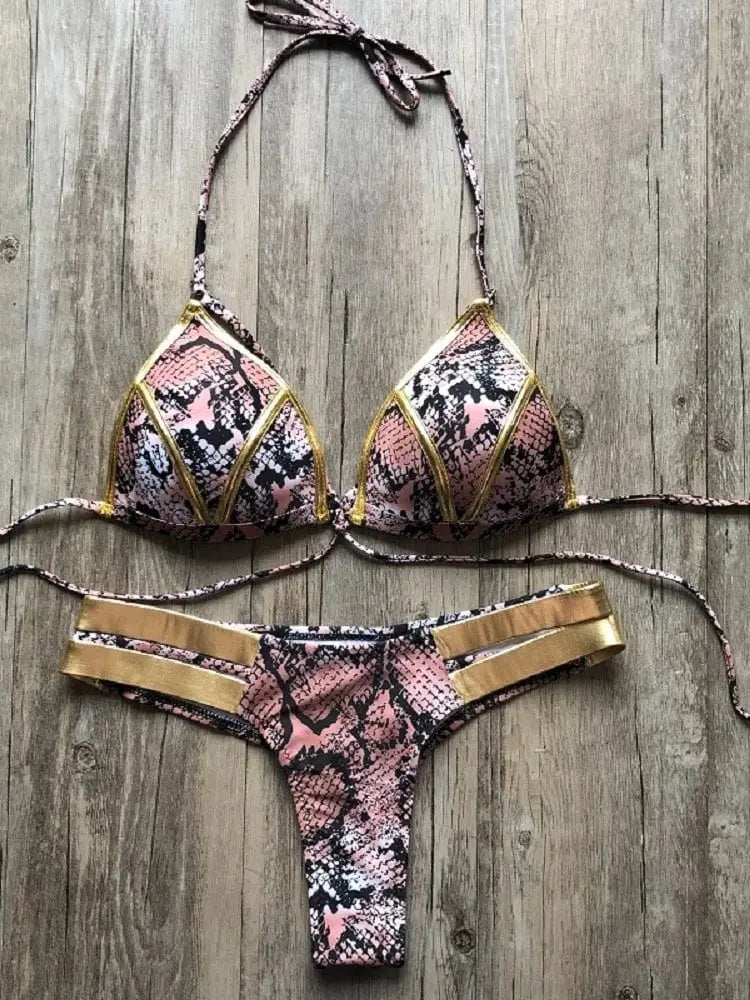Gold stamping bikini set by Showlu Fashion, padded Brazilian swimwear with gold accents, shown on a model.