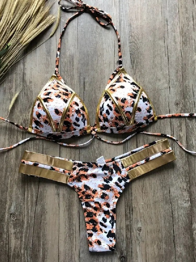Gold stamping bikini set by Showlu Fashion Store featuring padded Brazilian swimwear with stylish gold accents and a chic design.