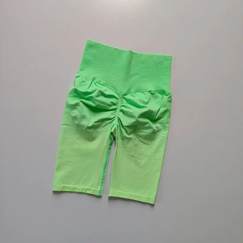 Showlu Women's high waist gradient cycling shorts with seamless design and hip lift features, suitable for fitness activities.