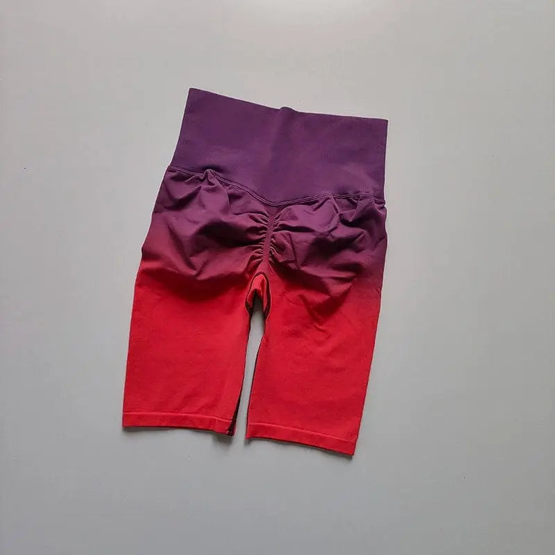 Showlu Women's high waist gradient cycling shorts with seamless design and hip lift, worn by a woman during workout.