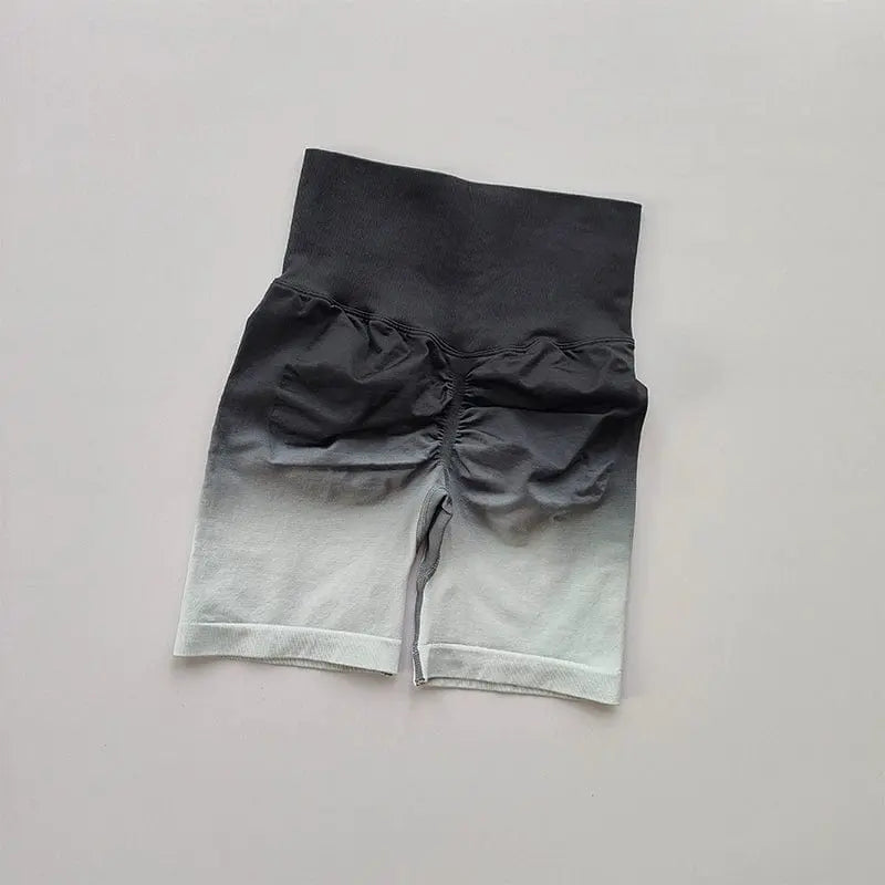 Showlu Women's high waist gradient cycling shorts with seamless design and hip lift feature, suitable for fitness and active wear.