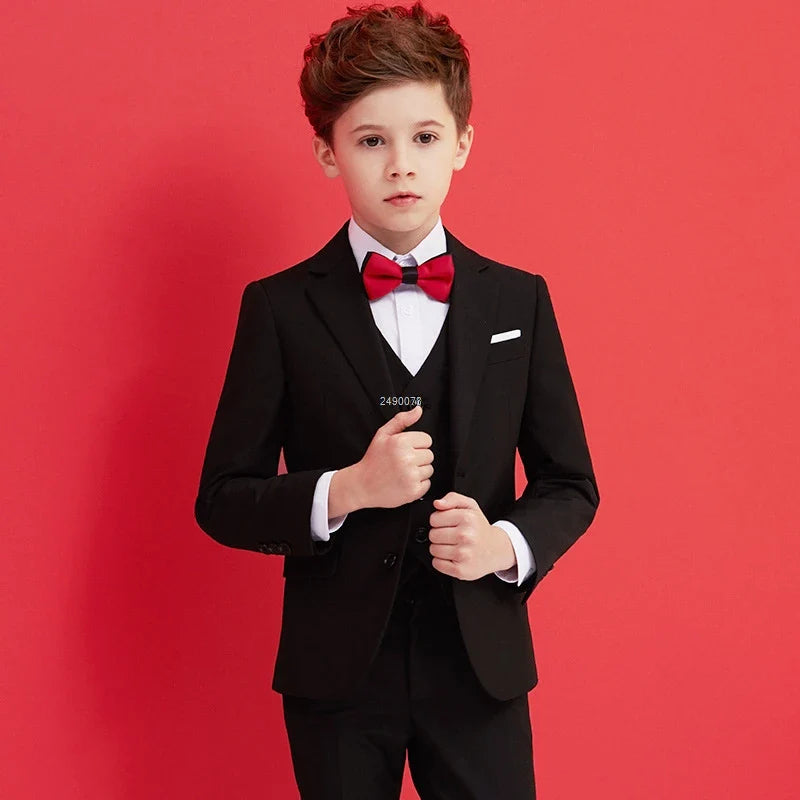 Kids boys black 007 wedding suit by SHOWLU FASHION STORE, includes formal blazer, vest, shirt, trousers, and bow tie.