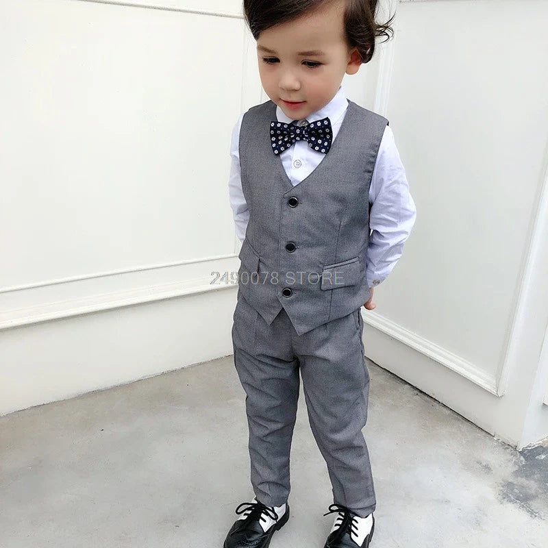 Kids formal tuxedo jacket set featuring a 3-piece wedding suit for boys, including a jacket, vest, and pants from SHOWLU FASHION STORE.