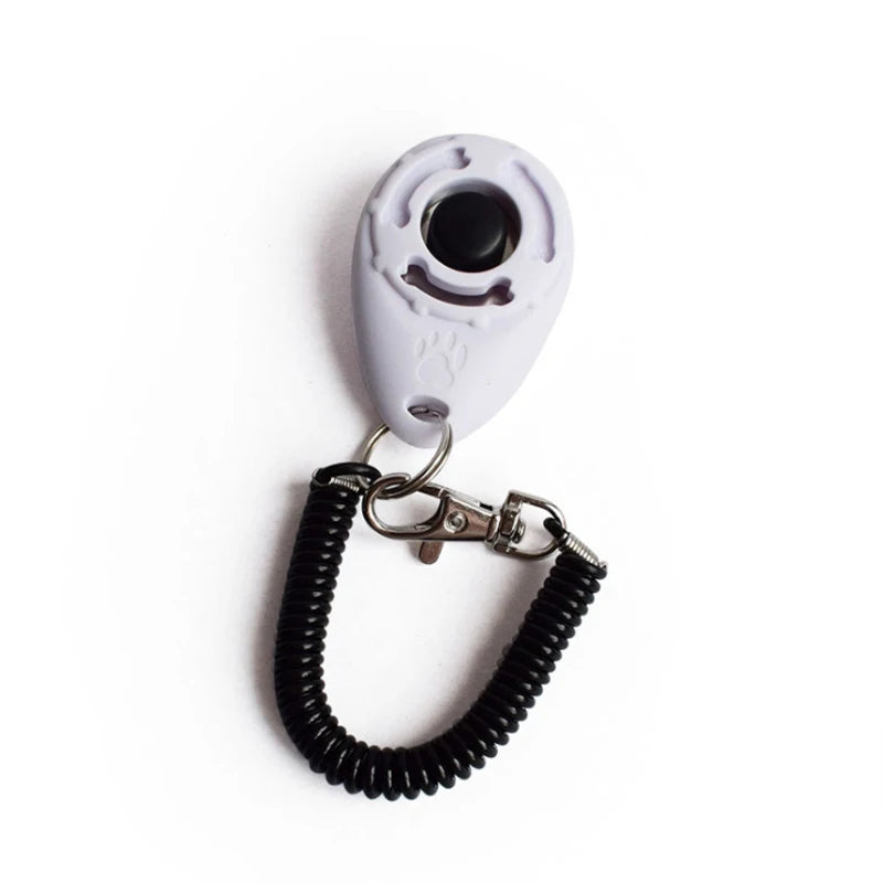 Showlu Smart General pet training clicker in black with a silver button, used for positive reinforcement during pet training sessions.