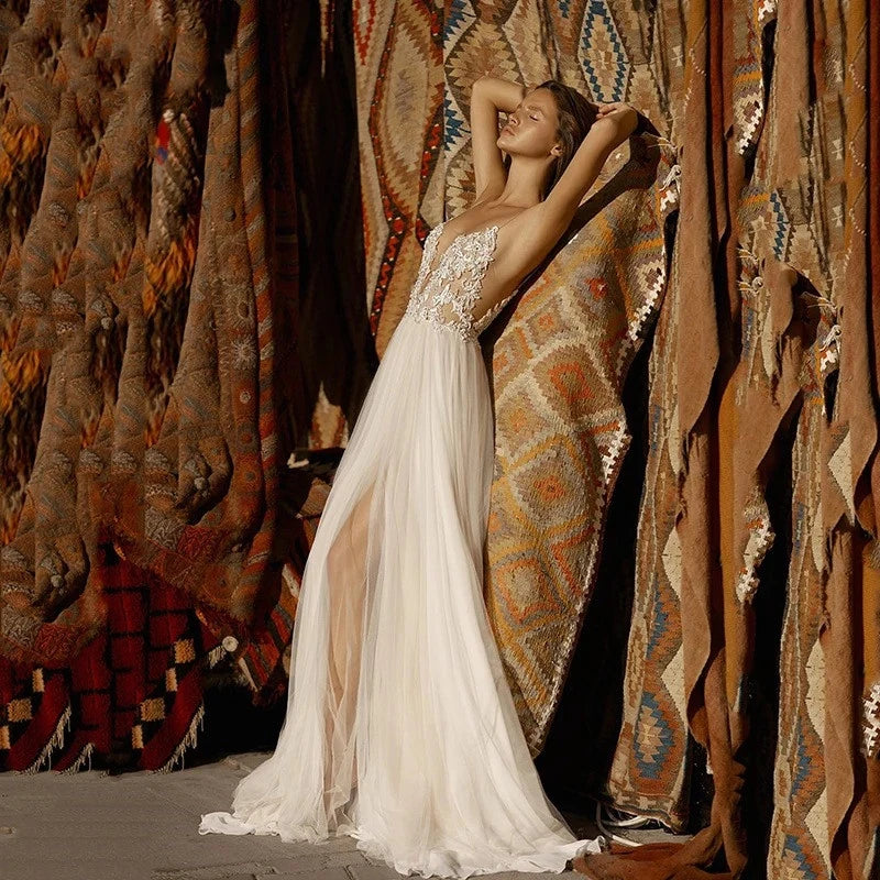 YASHANG Boho lace wedding dress with sexy V-neck and backless design, A-line gown featuring intricate lace details and flowing fabric.
