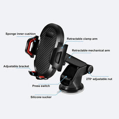 A black car phone holder with a suction cup base, adjustable mechanical arm, and side clamps.