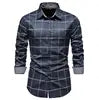 Men's plaid long sleeve casual shirt with cotton blend fabric, shown in a natural pose, from Showlu Fashion Store.