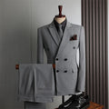 Slim fit men's double-breasted business suit from Yannisfashion, shown in a 2-piece set with tailored jacket and matching trousers.