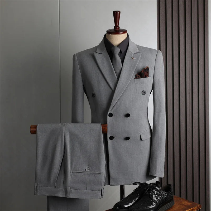 Slim fit men's double-breasted business suit from Yannisfashion, shown in a 2-piece set with tailored jacket and matching trousers.