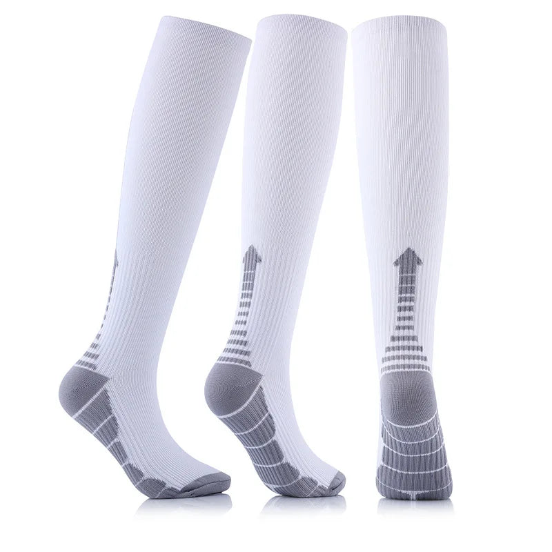 Black Showlu Fashion Store compression socks for men and women, designed for football and sports, with anti-fatigue and pain relief features.