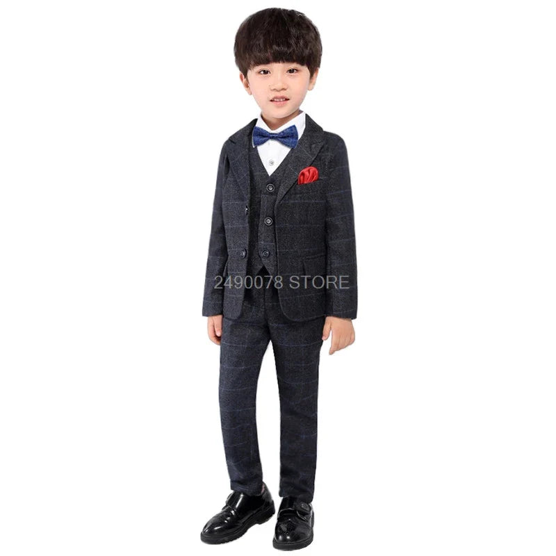 Kids boys plaid wedding suit by SHOWLU FASHION STORE, four-piece formal tuxedo set with jacket, shirt, bow tie, and trousers.