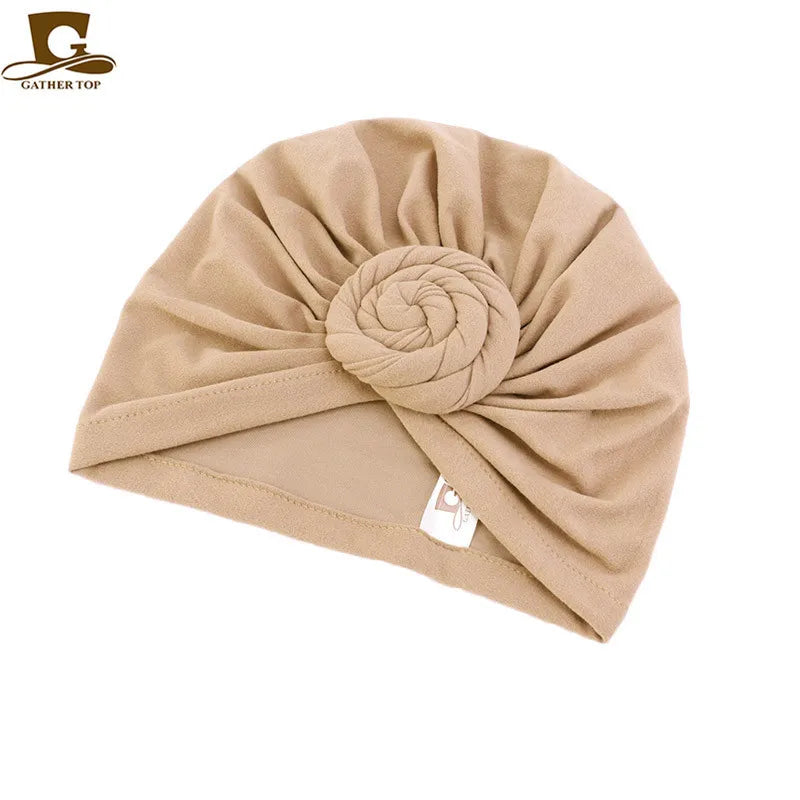 Women’s cotton knotted turban hat and hijab head covering, stylish Muslim bonnet, night cap, and hair accessory.