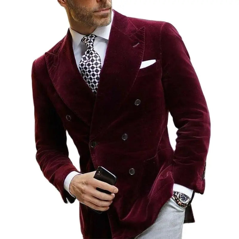 Men's burgundy velvet blazer with double-breasted design, elegant smoking suit coat for formal occasions, shown on a model.