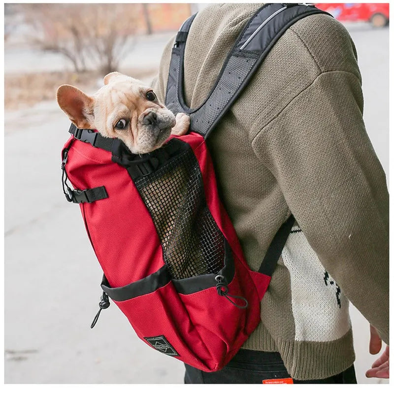 Showlu Fashion's Petguider breathable nylon dog carrier backpack for hiking and travel, featuring adjustable straps and mesh ventilation.