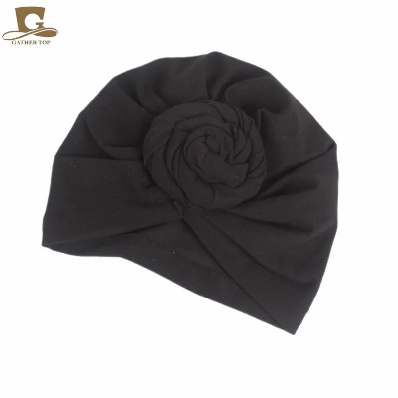 Women’s cotton turban hat with knot detail, Muslim hijab head covering, night cap, and hair accessory in black, by Showlu Fashion Store.