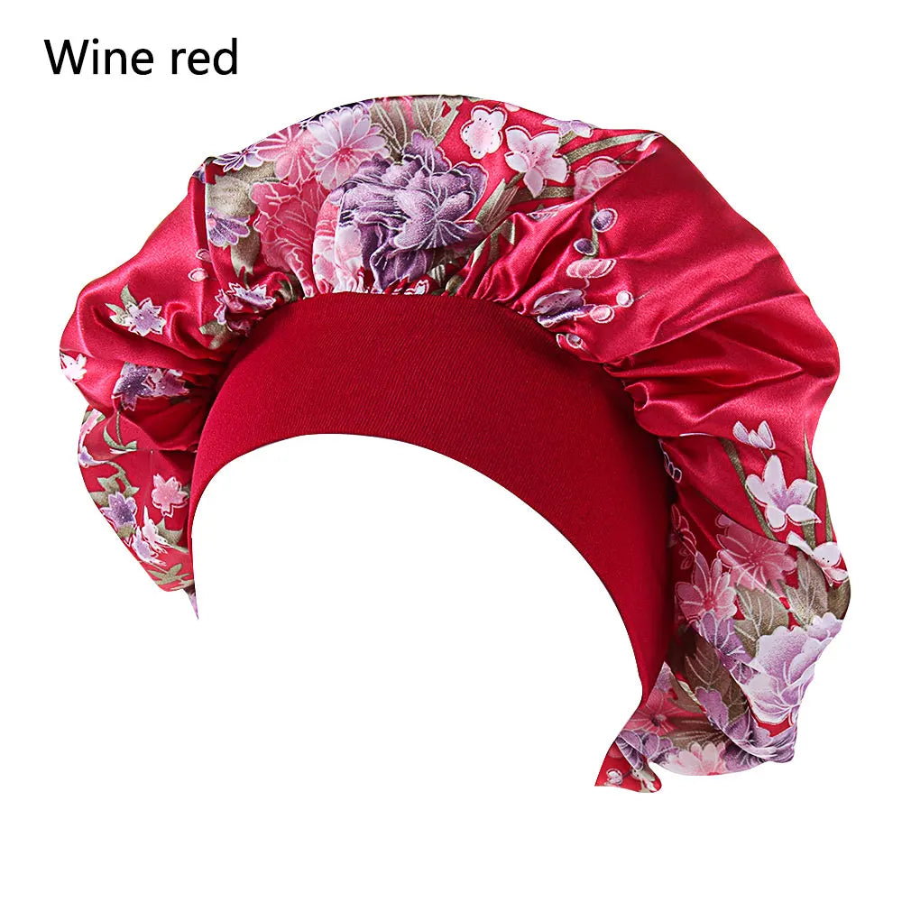 Elegant satin women's sleep bonnet with wide elastic band, ideal for hair care, chemo caps, and night head wraps.