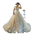Spring Princess lace A-line wedding dress with long sleeves, featuring elegant floral details and a flowing bridal gown silhouette.