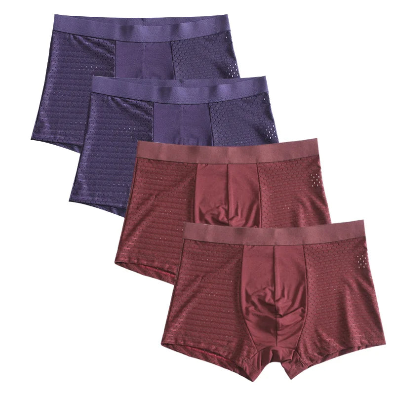 Set of four Showlu Men's Bamboo Fiber Boxer Shorts in breathable, comfortable underwear with soft elastic waistbands.