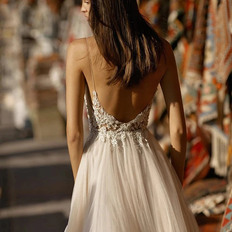 YASHANG Boho lace wedding dress with sexy V-neck, backless design, and A-line silhouette, featuring intricate lace details.