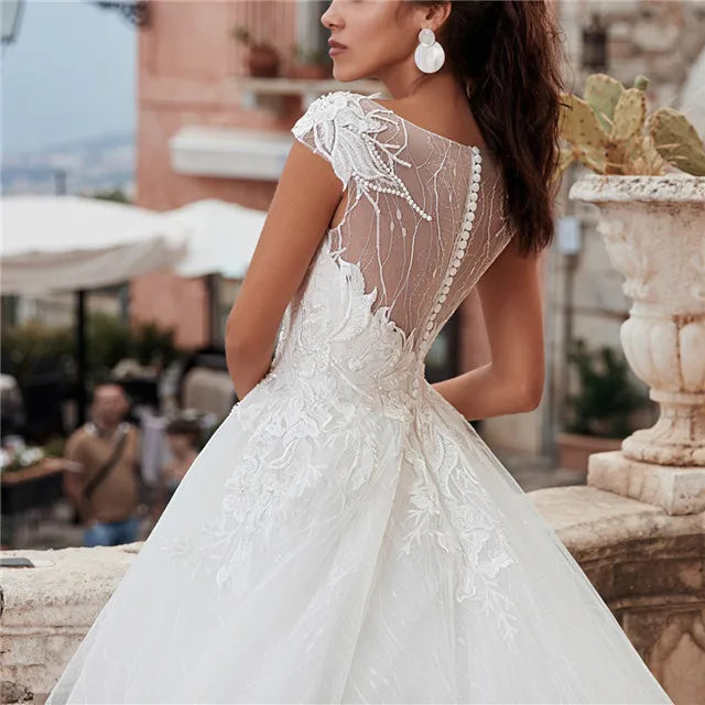 Showlu Fashion Cinderella ball gown wedding dress with lace sweetheart neckline and flowing maxi skirt for elegant bridal wear.