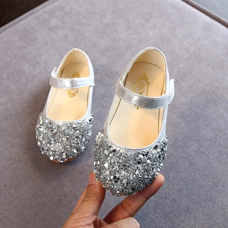 KushyShoo girls' glitter princess toddler flat dance sandals with colorful straps and sparkly embellishments, perfect for special occasions.