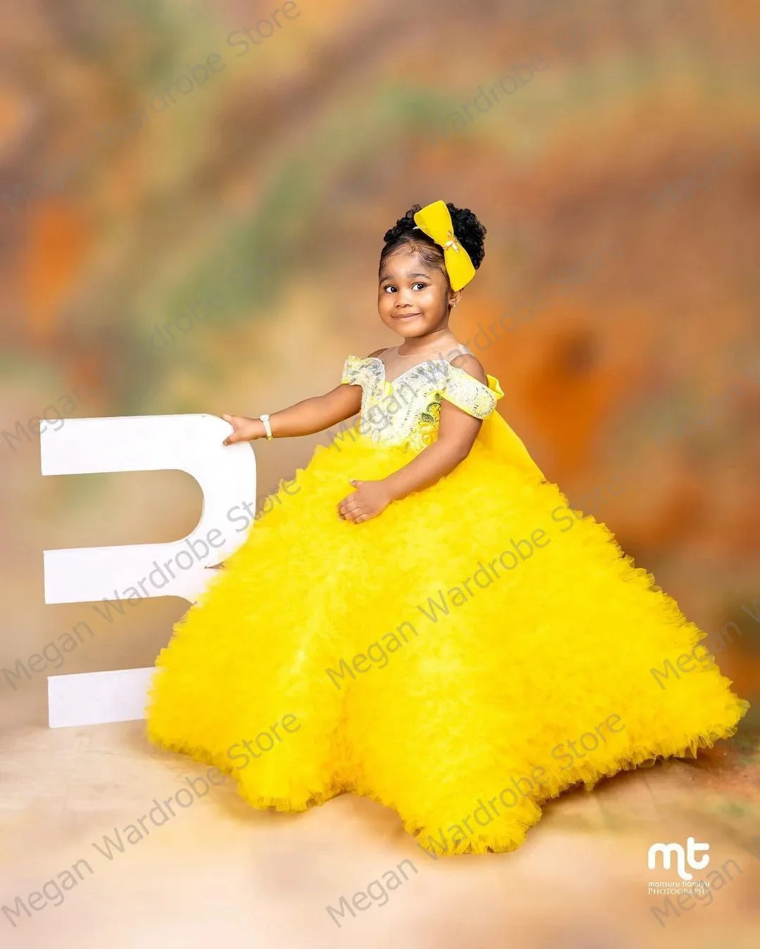 Yellow tiered tulle flower girl dress with big bow, from SHOWLU FASHION STORE, featuring a charming ball gown style for special occasions.