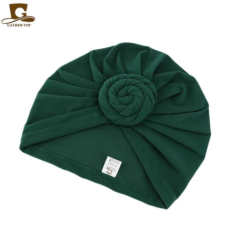 Women’s cotton turban hat with knotted design, Muslim hijab head covering, and hair accessory, suitable for chemo or night use.