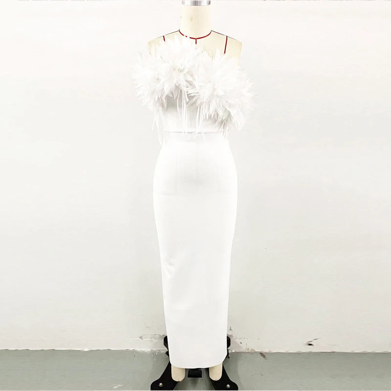 White 3D flower maxi dress by Showlu Fashion, elegant slim mermaid gown with floral details and fitted silhouette.