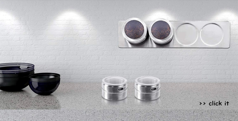 Set of magnetic stainless steel spice jars with clear lids, shown attached to a refrigerator for kitchen storage.
