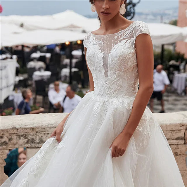 Aster Garden Cinderella ball gown wedding dress by Showlu Fashion Store featuring lace, sweetheart neckline, and a flowing maxi skirt.