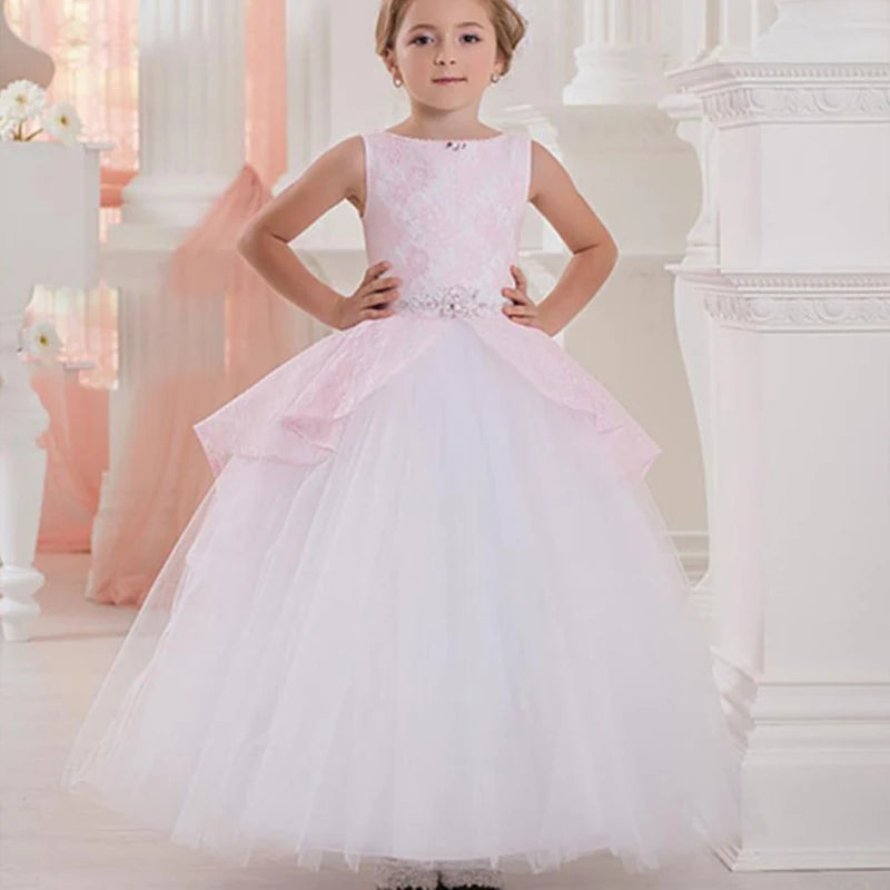White flower girl dress by Showlu Fashion Store with lace appliqué and beaded details, suitable for first communion.
