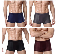 Four men wearing breathable mesh boxer shorts in blue, grey, black, and maroon.