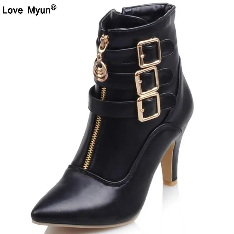 Black pointed toe Chelsea ankle boots for women with high heels, buckle detail, and zip closure from SHOWLU FASHION STORE.