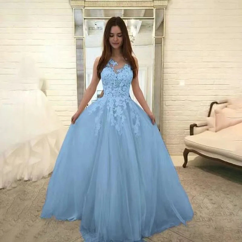 White V-neck lace wedding dress by Showlu Fashion Store featuring sleeveless tulle design and elegant bridal gown style.