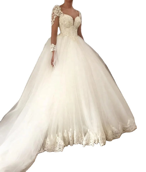 Aster Garden long sleeve lace ball gown wedding dress in luxurious white with intricate lace details and elegant silhouette.