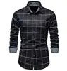 Men's plaid long sleeve casual shirt from Showlu Fashion, made of cotton blend fabric with a classic button-up design.