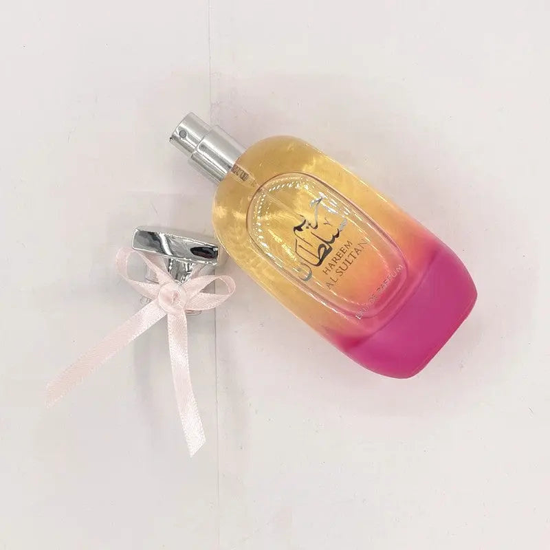 Arabian Hareem Al Sultan perfume for women featuring a romantic bow design, showcasing Middle Eastern floral fragrance.
