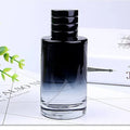 Showlu men's perfume 100ml bottle with long-lasting pure woody fragrance, stylish design, ideal for sophisticated scent.
