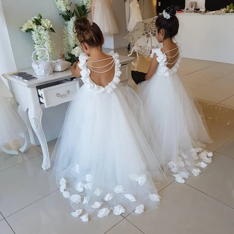 White flower girl dress by Gdybao featuring lace applique and beaded details, perfect for first communion and special occasions.