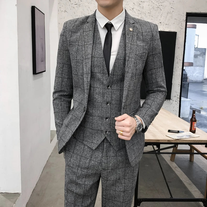 Left view of SHOWLU FASHION STORE men's 3-piece slim fit plaid business suit with jacket, vest, and pants.
