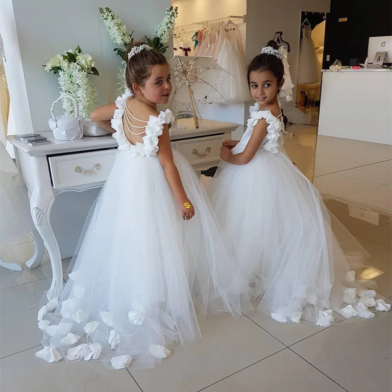 White flower girl dress by Gdybao featuring lace appliqué and beaded details, ideal for first communion or special occasions.