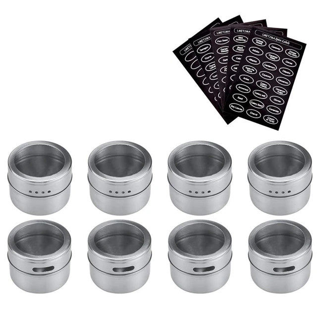 Magnetic stainless steel spice jar set for kitchen storage, featuring clear lids and organized on a magnetic strip by Showlu Smart General.