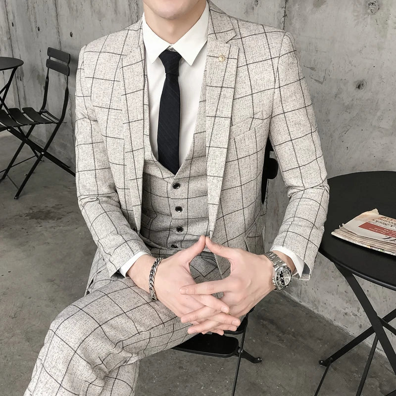 Left view of SHOWLU FASHION STORE men's 3-piece slim fit plaid business suit with jacket, vest, and pants.